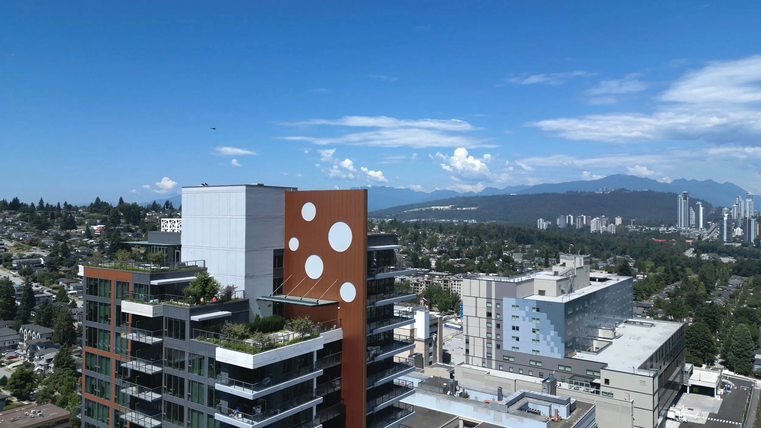 Aerial view of exterior cladding projects across Metro Vancouver