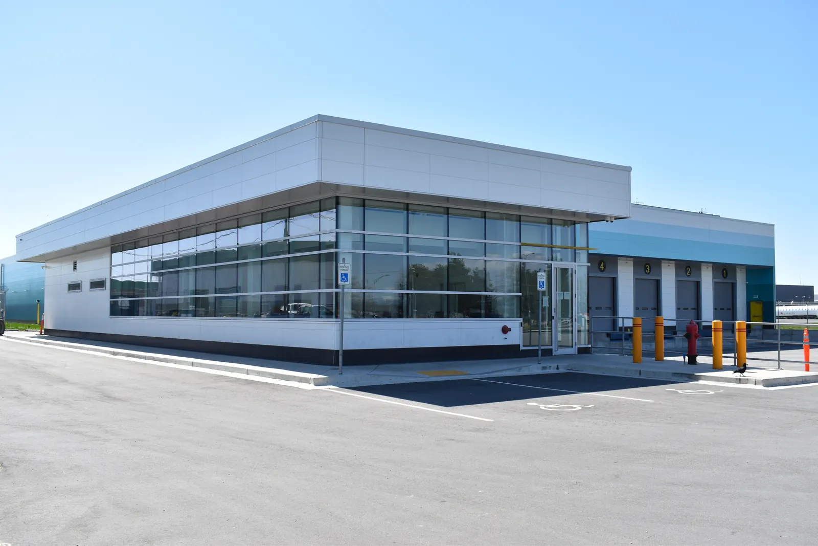 YVR: commercial exterior cladding in Richmond, BC by L2 Group — ACM & cementitious panels