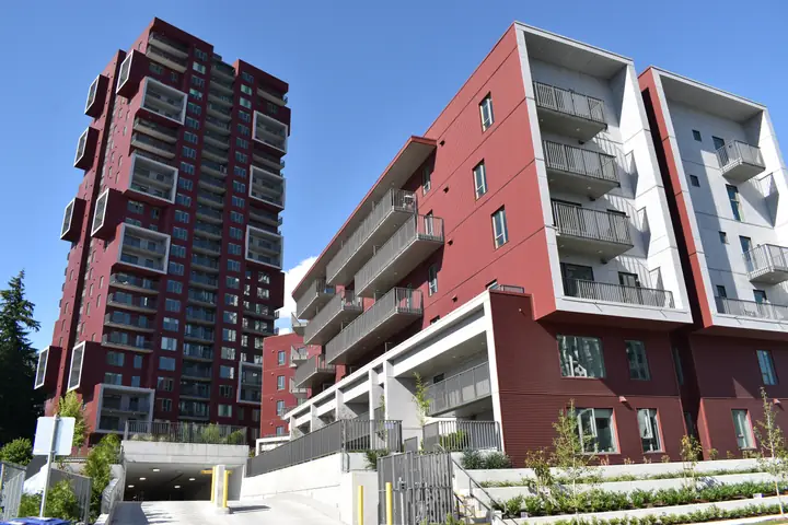 Sawmill: high-rise exterior cladding in Vancouver, BC by L2 Group — Corrugated metal, Kol & high-density panels