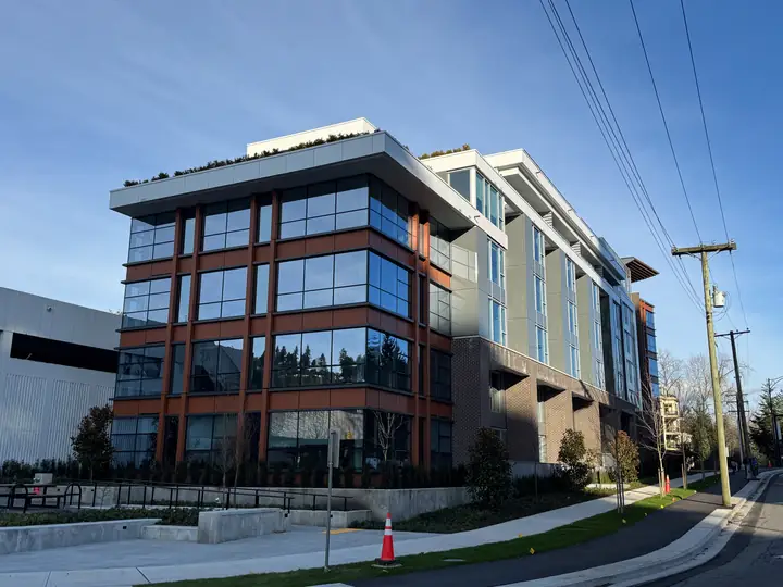 Executive on the Park: mid-rise exterior cladding in West Vancouver, BC by L2 Group — ACM & cementitious panels