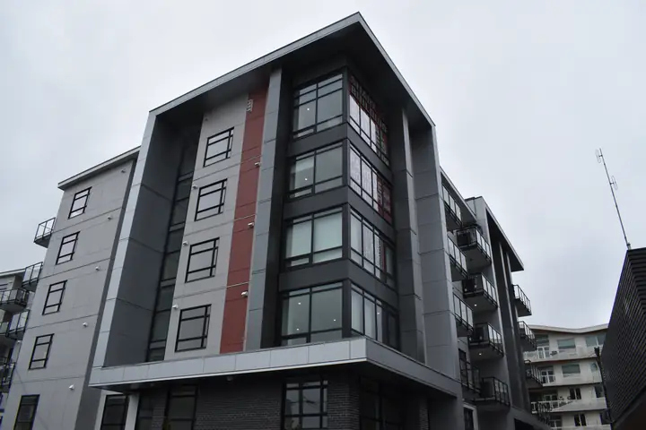 Parque on Park: mid-rise exterior cladding in Langley, BC by L2 Group — ACM & cementitious panels